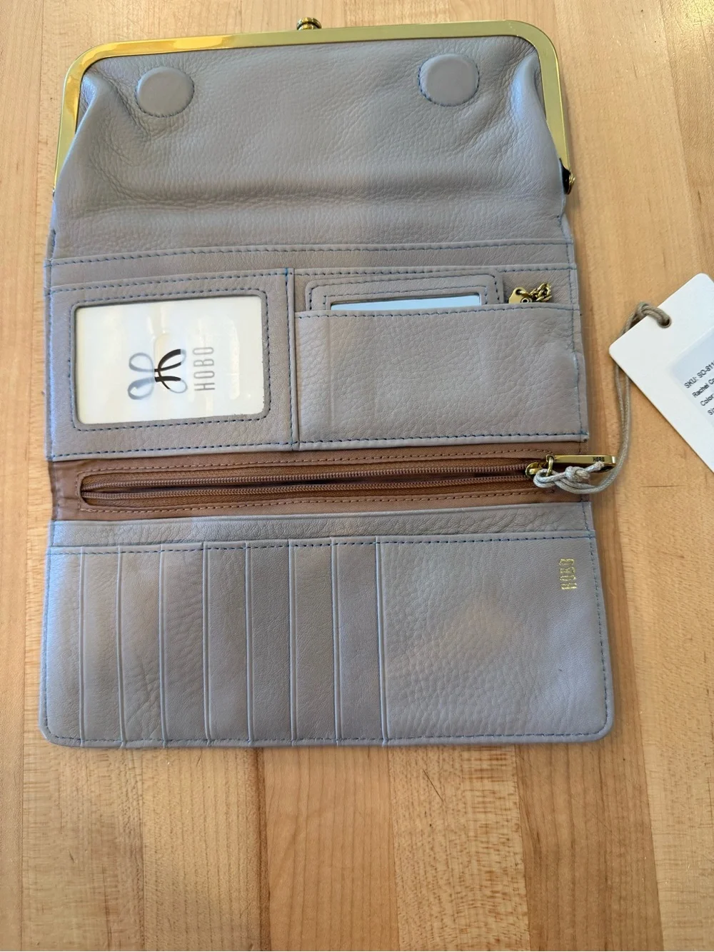 HOBO Gray Fold-Over Wallet Clutch with Blue Accent and Gold Trim